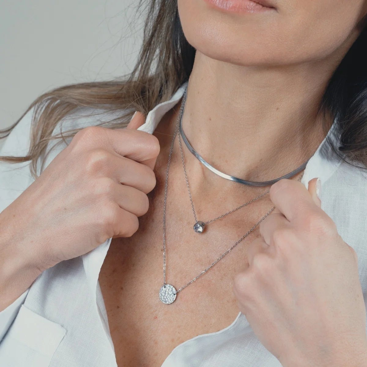 COLLAR PUNTO DE LUZ PLATA